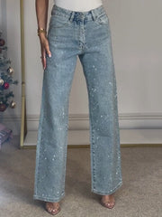 JEANS TIRO ALTO CON DETALLES DE PEDRERIA