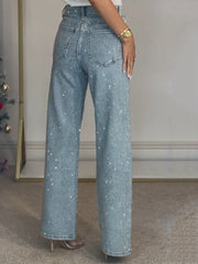 JEANS TIRO ALTO CON DETALLES DE PEDRERIA