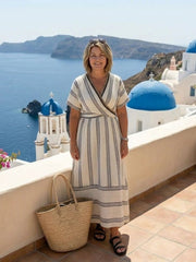 Garrucha | Vestido midi con escote en V, manga corta y cintura envolvente