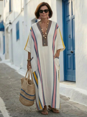 Noemi | Vestido maxi con escote en V, de manga corta y bolsillos