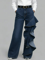 PANTALÓN VAQUERO WIDE LEG CON VOLANTE ASIMÉTRICO