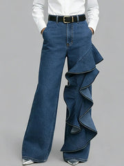 PANTALÓN VAQUERO WIDE LEG CON VOLANTE ASIMÉTRICO