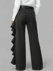PANTALÓN VAQUERO WIDE LEG CON VOLANTE ASIMÉTRICO